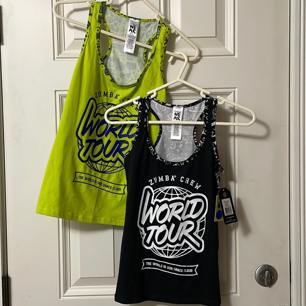 2 for 1! NWT! Zumba racerback tanks in Zumba green (S) and black (XS).